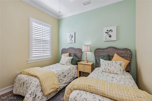 bedroom with crown molding