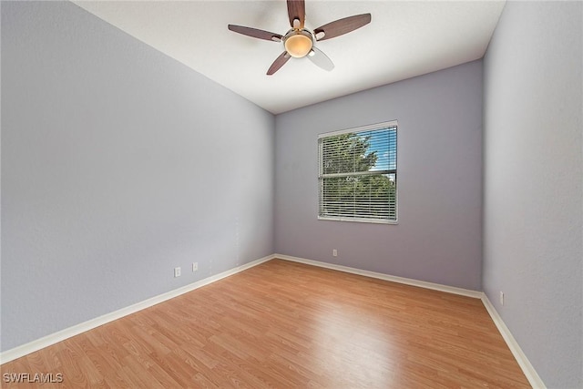 spare room with ceiling fan and light hardwood / wood-style flooring