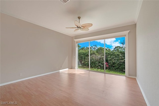 empty room featuring crown molding, ceiling fan, and light hardwood / wood-style floors