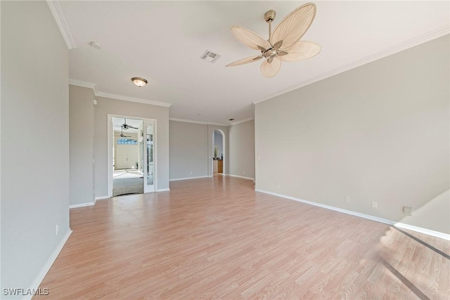 unfurnished room with crown molding, ceiling fan, and light hardwood / wood-style floors