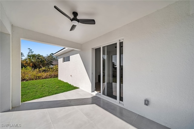 view of patio with ceiling fan