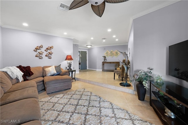 living room with crown molding, ceiling fan, and light tile patterned flooring