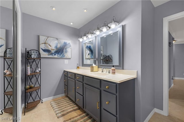 bathroom with vanity and tile patterned flooring