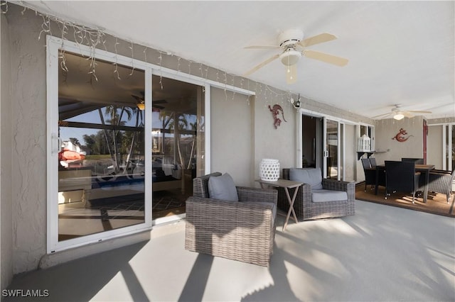 view of patio featuring ceiling fan