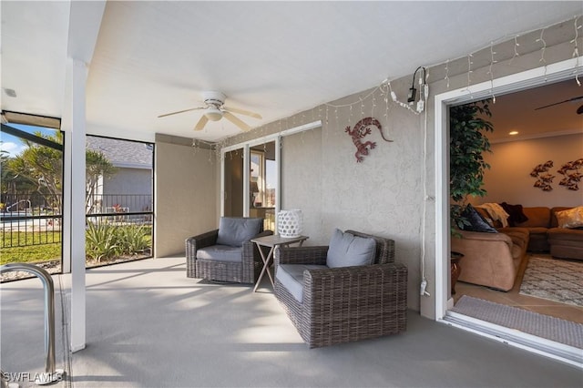 view of patio featuring ceiling fan