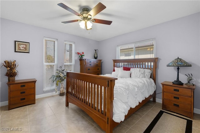 bedroom featuring light tile patterned floors and ceiling fan