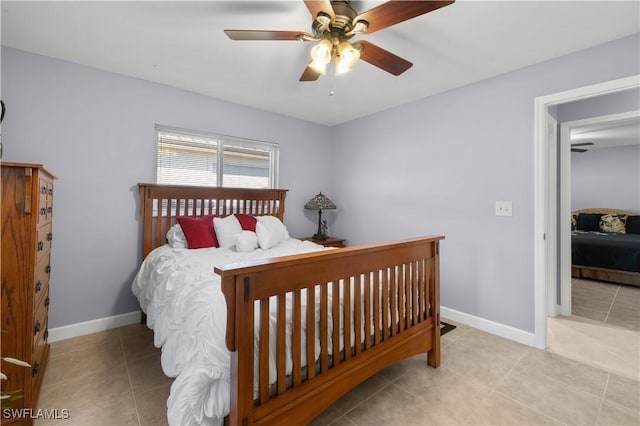 bedroom with light tile patterned flooring and ceiling fan