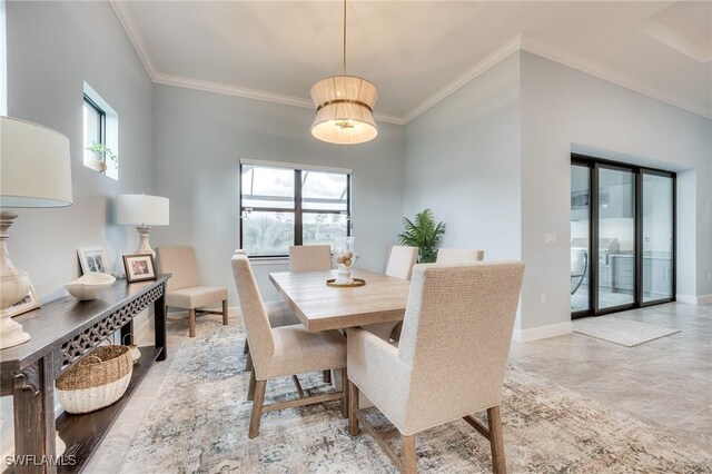 dining area featuring crown molding