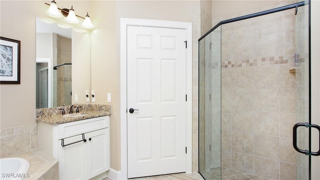 bathroom with vanity and plus walk in shower