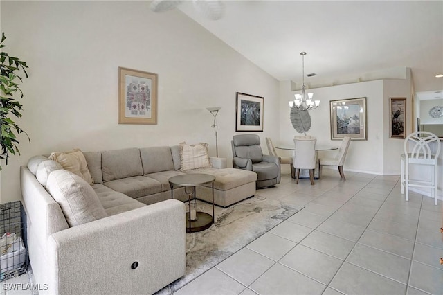 living room with light tile patterned floors, high vaulted ceiling, baseboards, and a notable chandelier