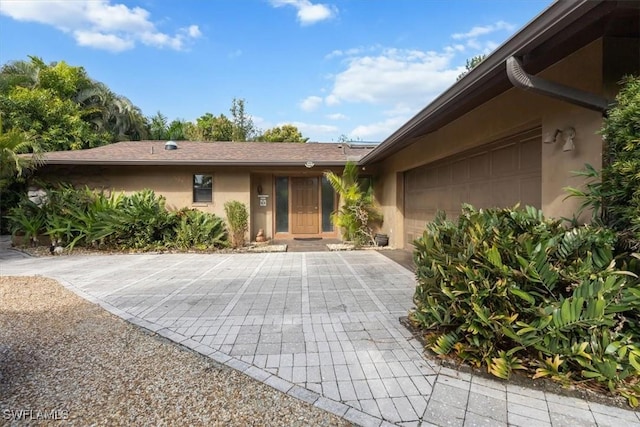 ranch-style house with a garage