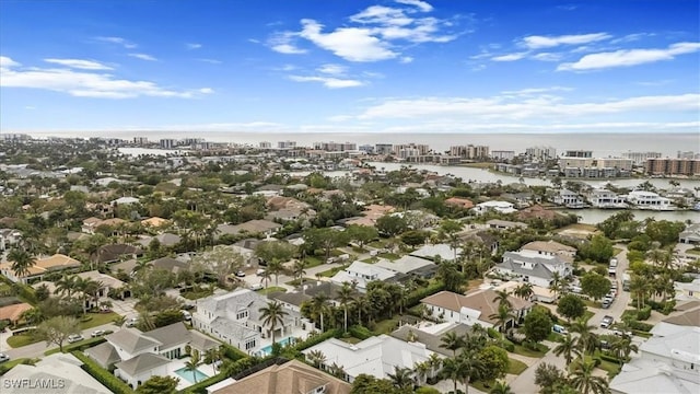 bird's eye view with a water view