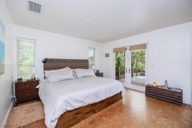 bedroom featuring french doors and access to exterior