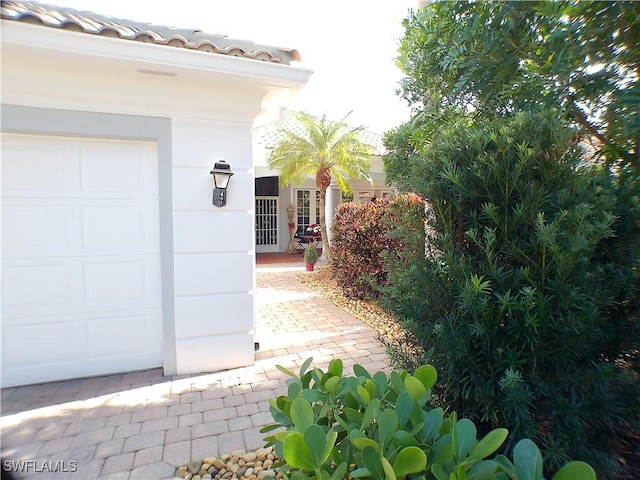 exterior space with a garage