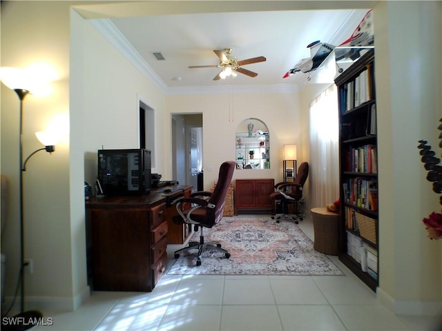 office area with light tile patterned flooring, ceiling fan, and ornamental molding