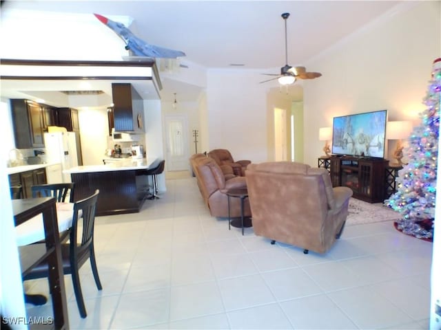 living room with light tile patterned floors and ceiling fan