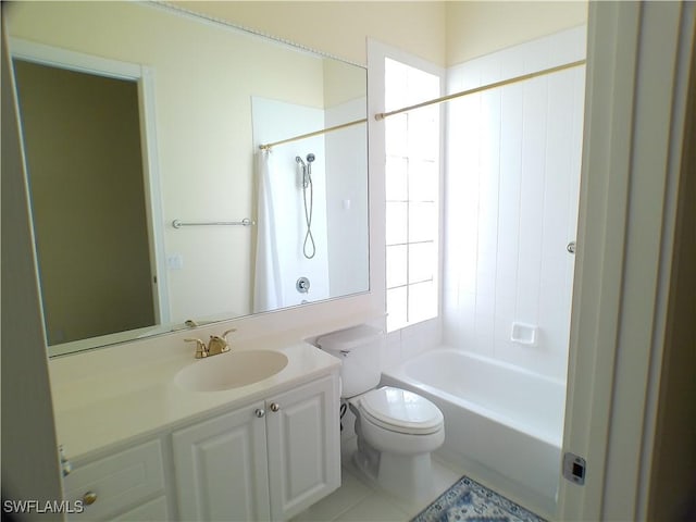 full bathroom featuring vanity, tile patterned floors, washtub / shower combination, and toilet