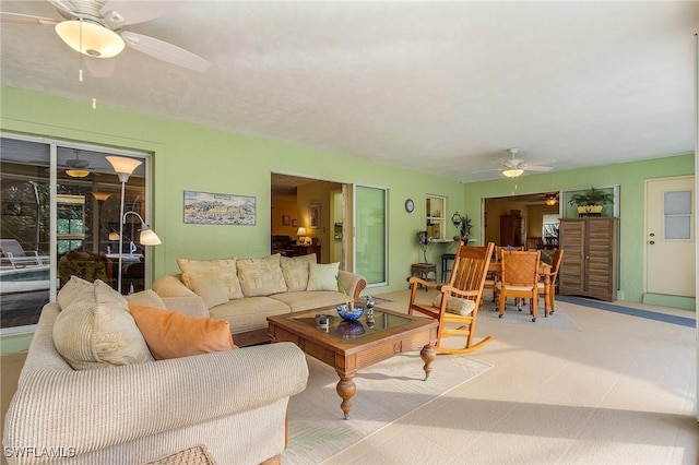 living room with ceiling fan