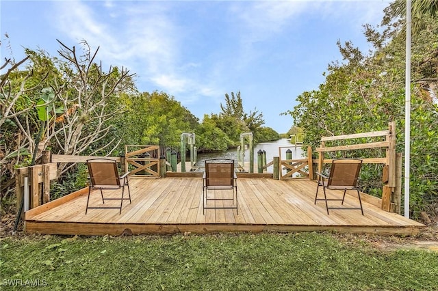 wooden terrace with a water view