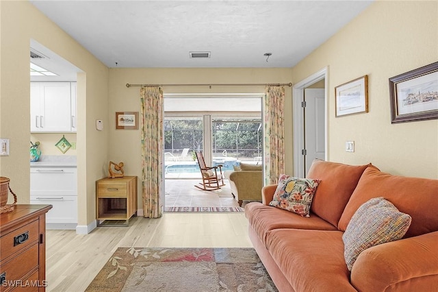 living room with light wood-type flooring