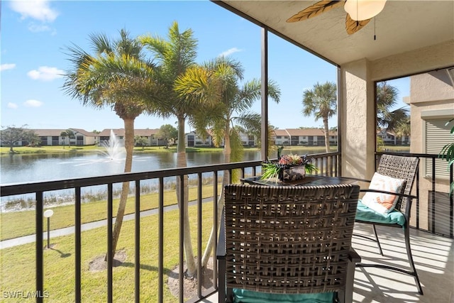 balcony featuring a water view