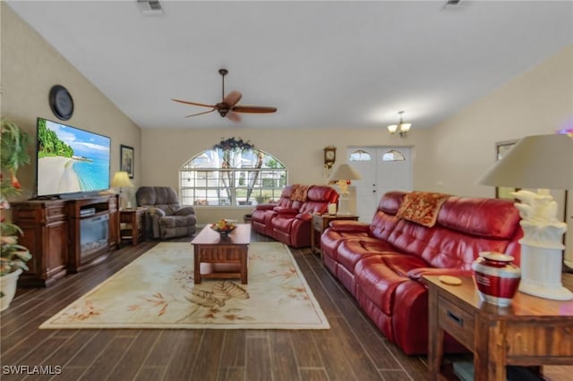 living room featuring a fireplace, ceiling fan, dark hardwood / wood-style floors, and lofted ceiling