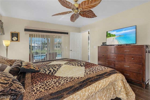 bedroom featuring ceiling fan, access to exterior, and dark wood-type flooring