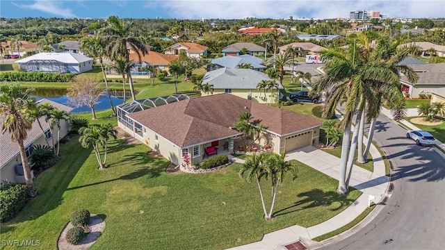 bird's eye view with a water view