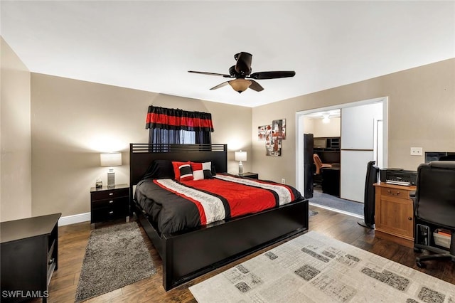 bedroom featuring dark hardwood / wood-style floors and ceiling fan