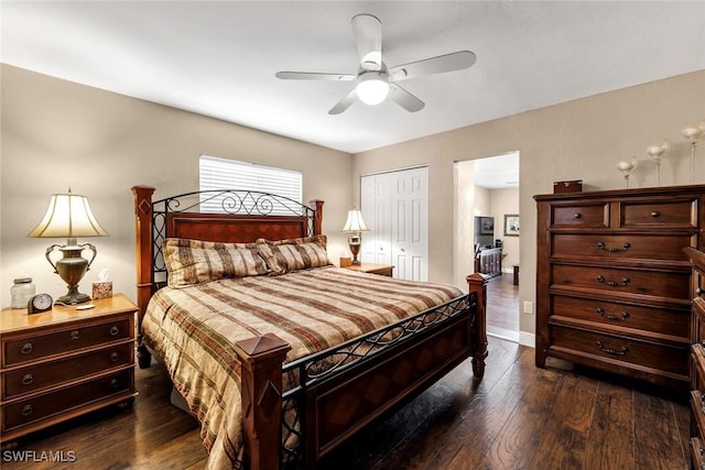 bedroom with ceiling fan, dark hardwood / wood-style flooring, and a closet