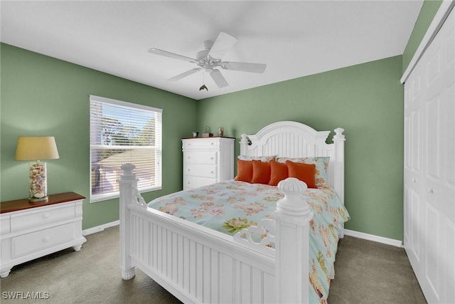 bedroom featuring carpet, ceiling fan, and a closet