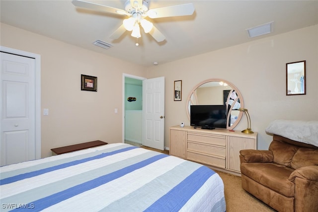 carpeted bedroom featuring ceiling fan