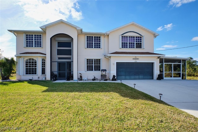 front facade with a garage and a front lawn