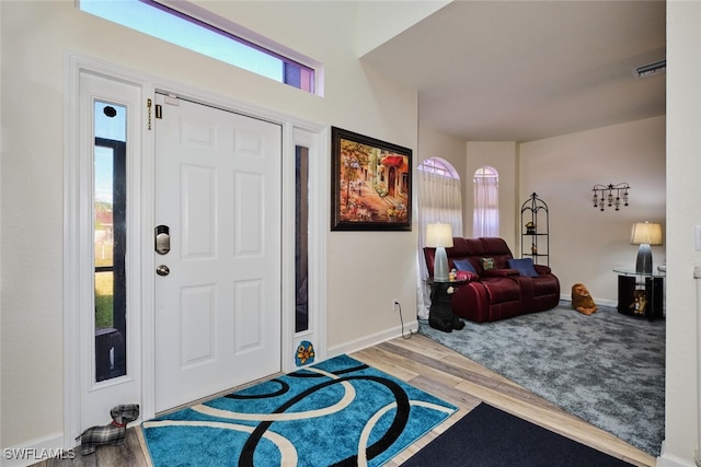 entryway featuring a healthy amount of sunlight and light wood-type flooring