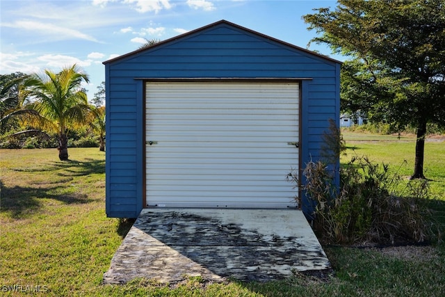 garage with a lawn