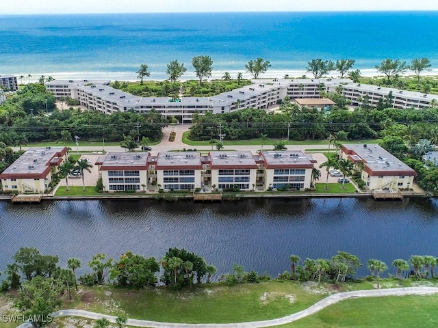 birds eye view of property featuring a water view