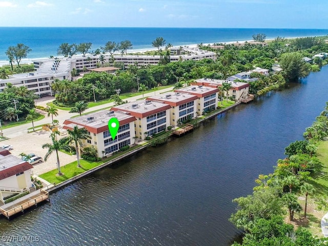 bird's eye view with a water view