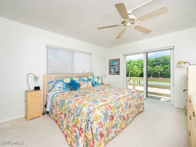 carpeted bedroom with access to exterior and ceiling fan