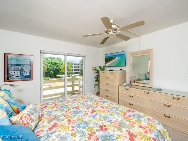 bedroom with ceiling fan and access to outside