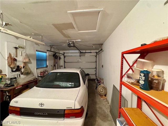 garage featuring a garage door opener