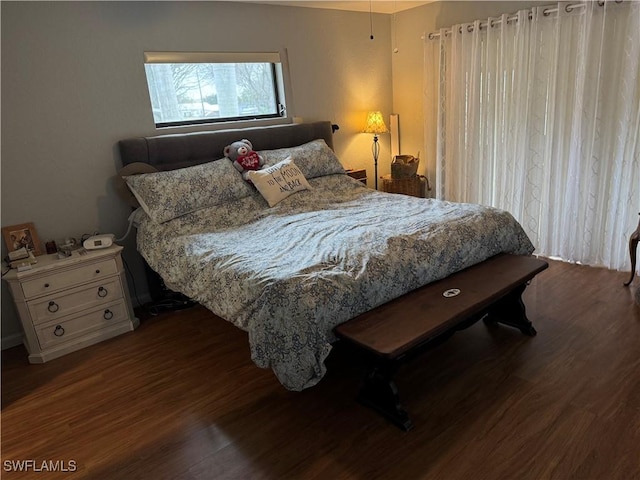 bedroom featuring hardwood / wood-style floors