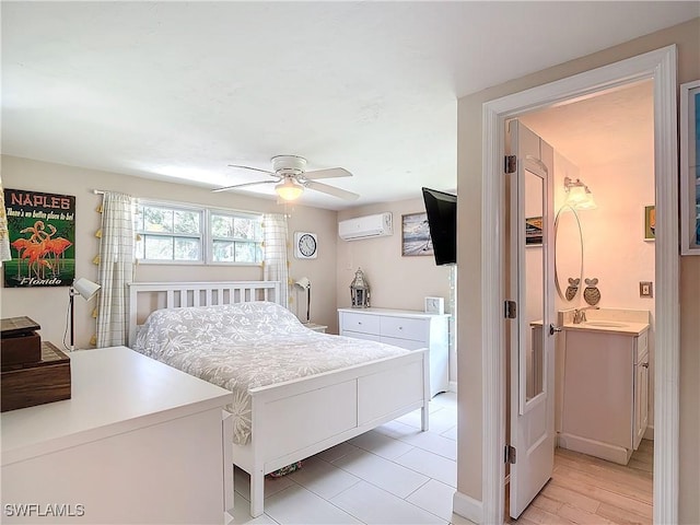 bedroom with ceiling fan and a wall unit AC