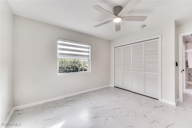 unfurnished bedroom featuring a closet and ceiling fan