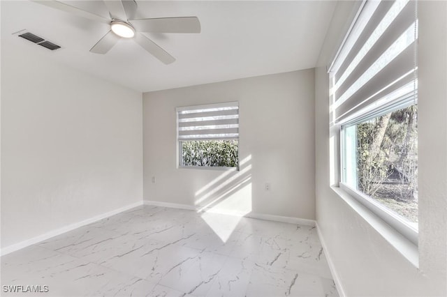 spare room featuring ceiling fan