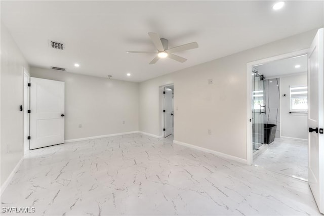 spare room featuring ceiling fan