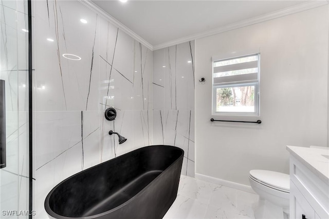 bathroom with a tub, toilet, vanity, and ornamental molding