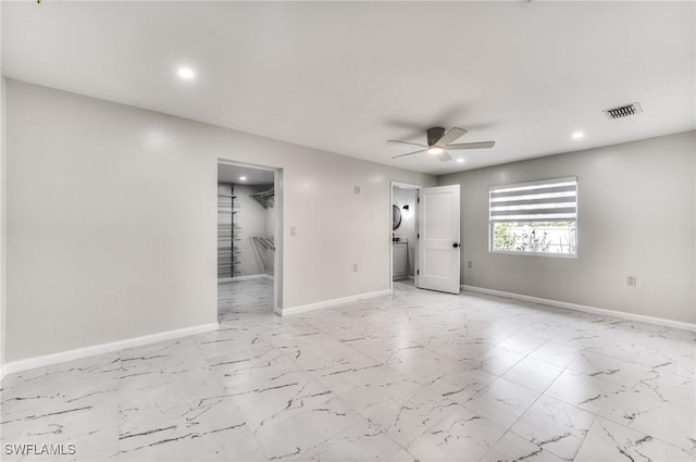 spare room featuring ceiling fan