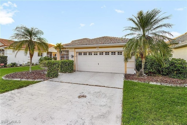 view of front of house featuring a garage, driveway, a tiled roof, and stucco siding