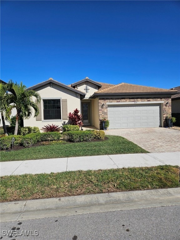 view of front of home with a garage