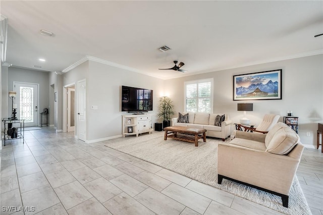 tiled living room featuring ceiling fan and ornamental molding